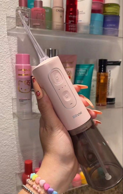 Portable Oral Irrigator – جهاز تنظيف الأسنان بالماء المحمول