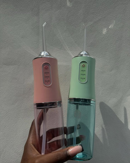 Portable Oral Irrigator – جهاز تنظيف الأسنان بالماء المحمول